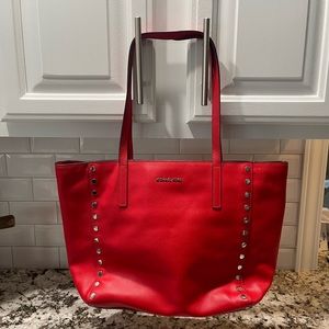 MK red leather and silver stud tote style bag
